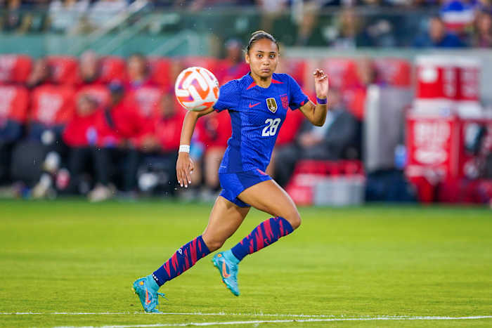 Alyssa Thompson of the United States chases a ball during a game between Ireland and USWNT.